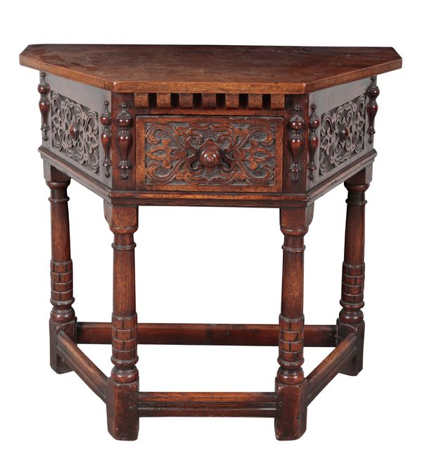 AN OAK CREDENCE TABLE IN JACOBEAN TASTE