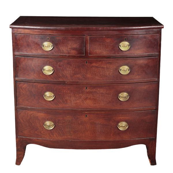 A REGENCY MAHOGANY BOW FRONT CHEST OF DRAWERS