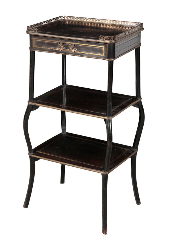 A VICTORIAN EBONISED AND GILT METAL MOUNTED ETAGERE