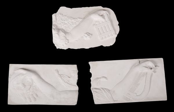 THREE PLASTER MOULDED FRAGMENTS