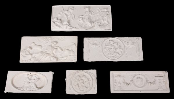 A GROUP OF SIX PLASTER FRIEZE MOULDINGS
