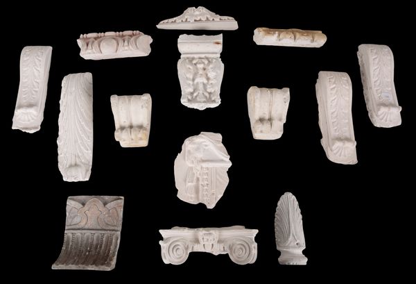 A COLLECTION OF FOURTEEN ARCHITECTURAL PLASTER MOULDINGS