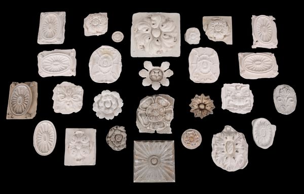 A GROUP OF TWENTY FIVE PLASTER PATERAE