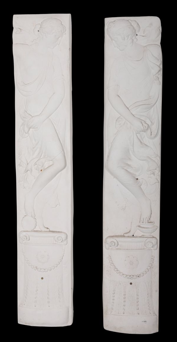 A PAIR OF OPPOSING PLASTER RELIEFS OF CLASSICAL MUSES
