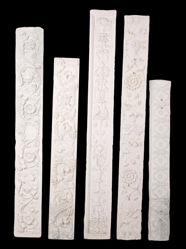 A GROUP OF FIVE PLASTER FRIEZE MOULDINGS