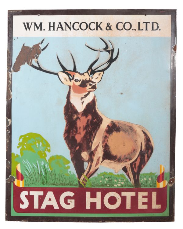 AN ENAMEL ADVERTISING SIGN FOR 'STAG HOTEL'