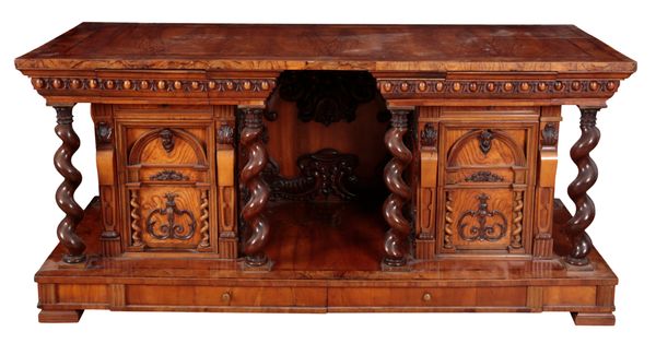 AN IMPRESSIVE RENAISSANCE REVIVAL WALNUT AND BURR WALNUT LIBRARY CABINET