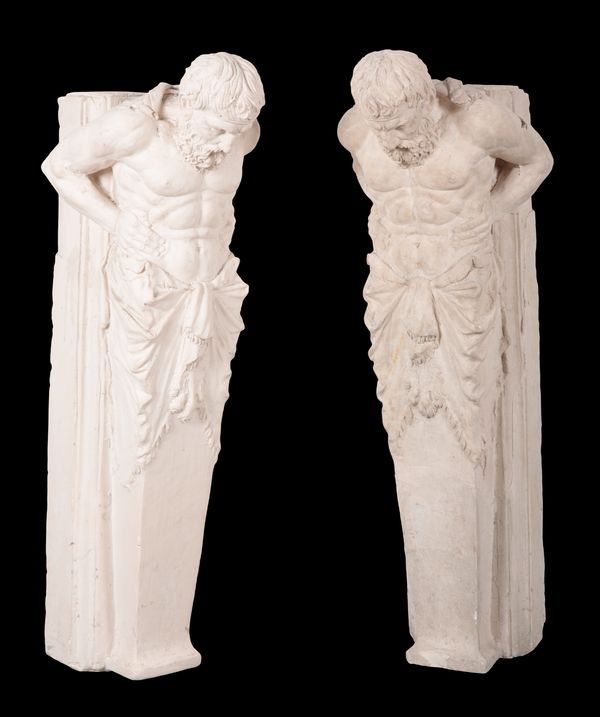 A PAIR OF LARGE PLASTER ATLANTES