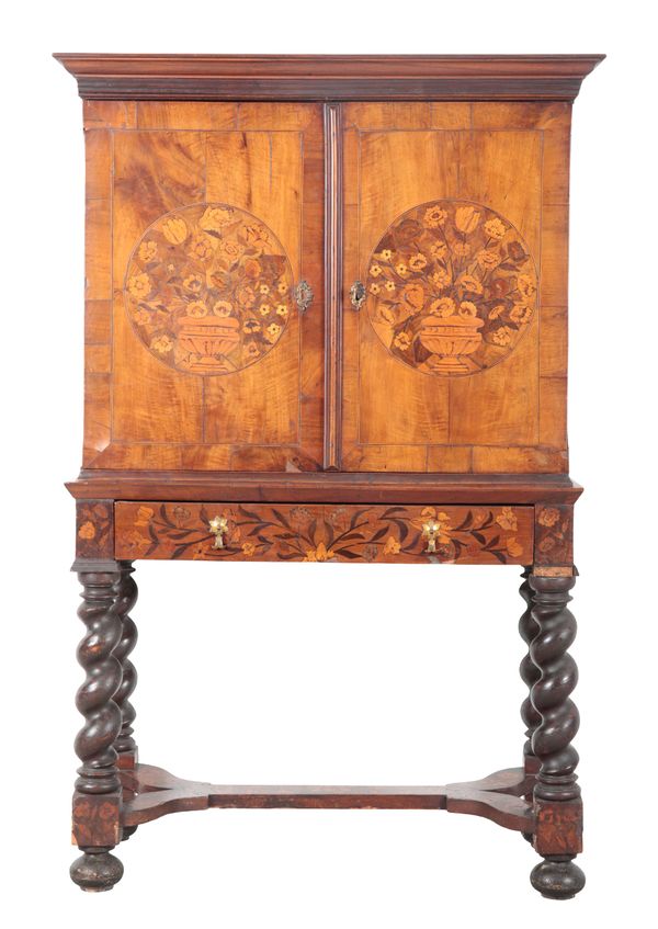 A WILLIAM AND MARY WALNUT AND MARQUETRY CABINET ON STAND