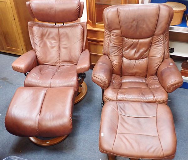 TWO LEATHER RECLINING LOUNGE CHAIRS