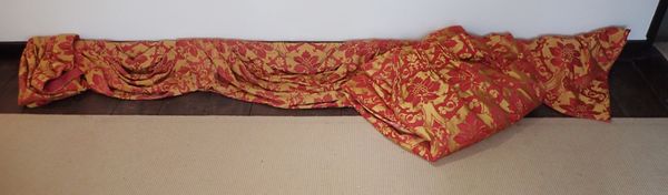 A 20TH CENTURY RED AND GOLD LEAF PATTERN SATIN PELMET