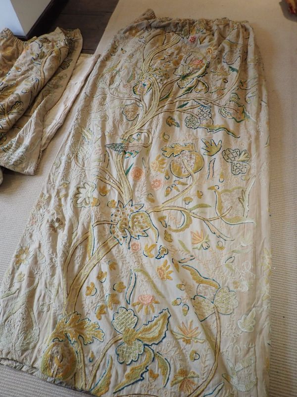 A PAIR OF EARLY 20TH CENTURY EMBROIDERED WOOLLEN CURTAINS