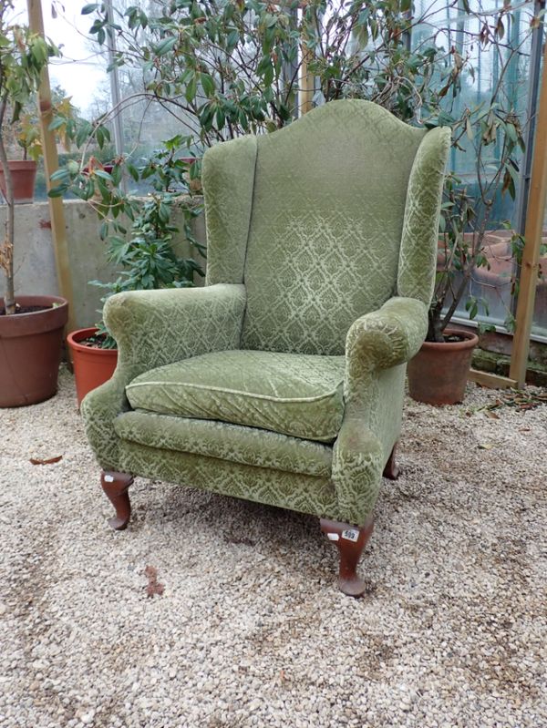 A 1920S WING ARMCHAIR