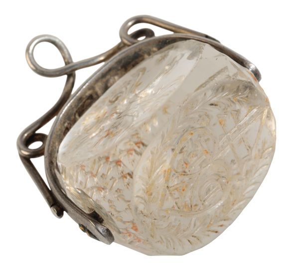 A CRESTED ROCK CRYSTAL SWIVEL FOB