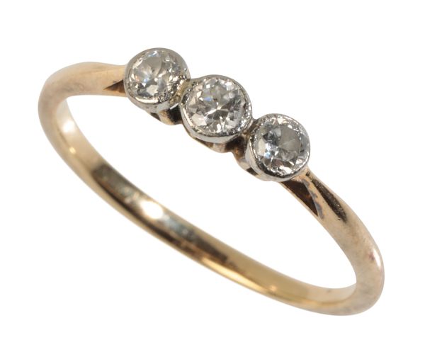 A THREE STONE DIAMOND RING