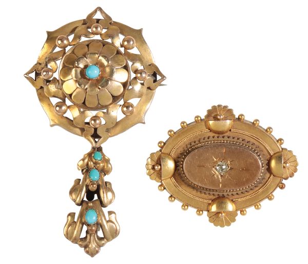 AN ETRUSCAN REVIVAL DIAMOND-SET LOCKET-BACK BROOCH