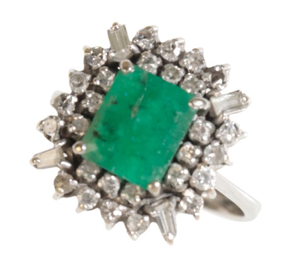 AN EMERALD AND DIAMOND CLUSTER RING