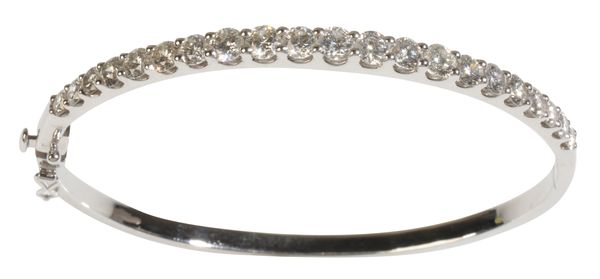 A HALF-SET DIAMOND BANGLE