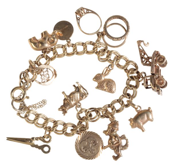 A 9CT GOLD CHARM BRACELET