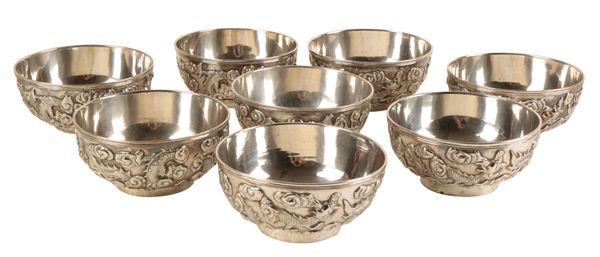 A SET OF EIGHT CHINESE SILVER BOWLS BY WANG HING & CO