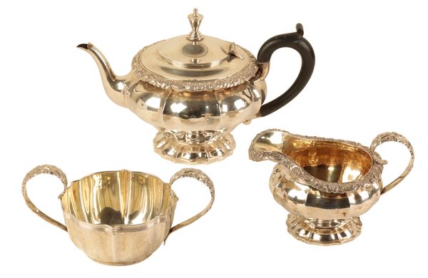 A GEORGE III/IV SILVER MATCHED TWO PIECE TEA SERVICE