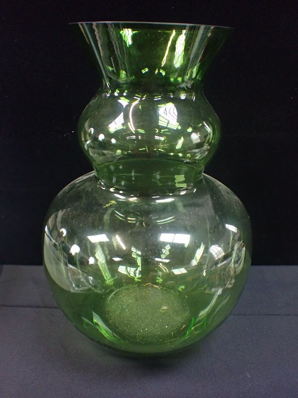 A LARGE GREEN GLASS VASE