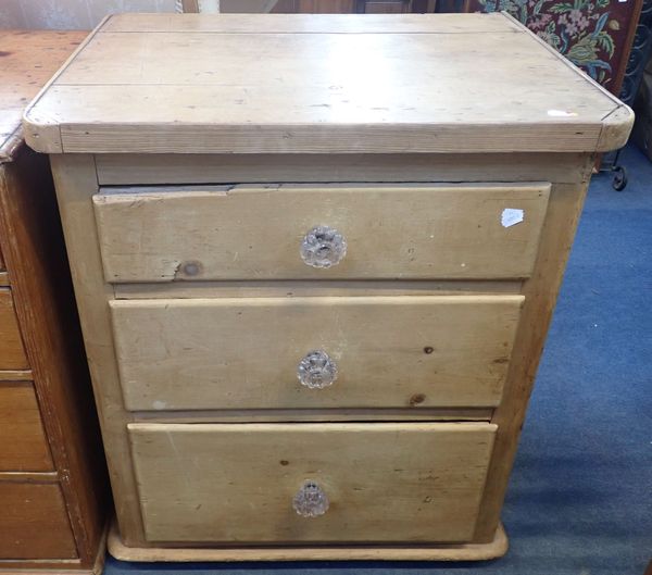 A VICTORIAN PINE THREE-DRAWER CHEST