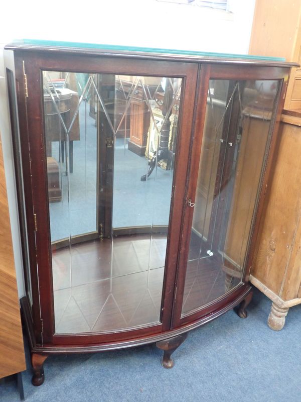 A GLAZED BOW FRONTED REPRODUCTION MAHOGANY CABINET