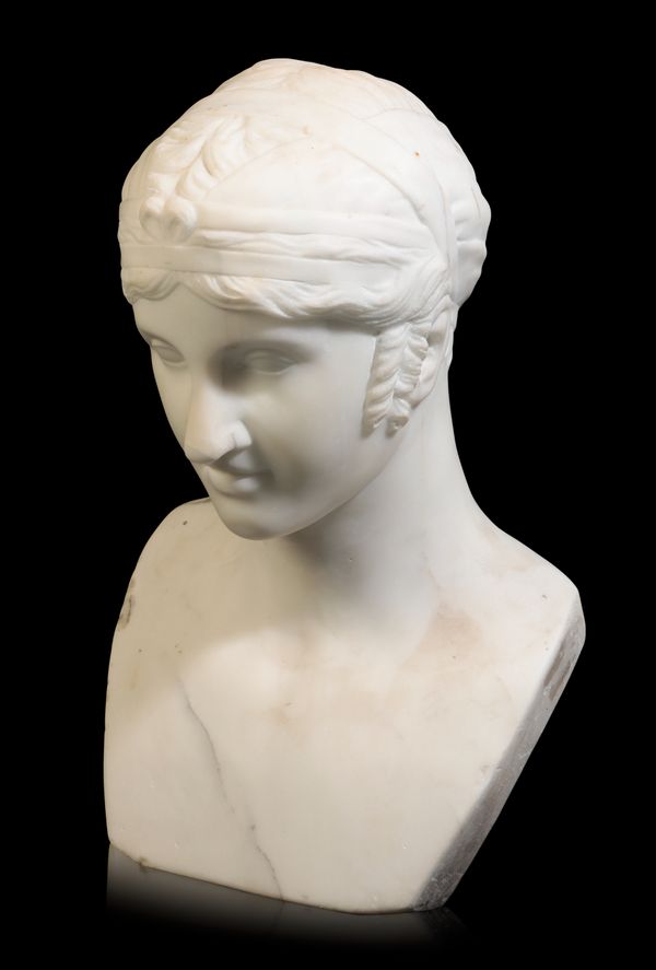 A WHITE MARBLE BUST OF A YOUTH