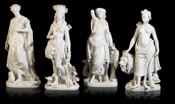 A GROUP OF FOUR WHITE-GLAZED PORCELAIN FIGURES OF 'THE CONTINENTS'