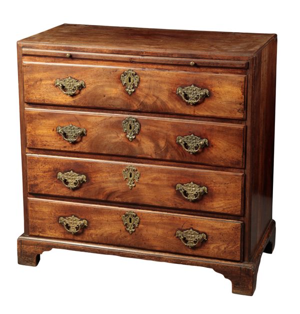 A GEORGE III MAHOGANY CADDY-TOP CHEST OF DRAWERS