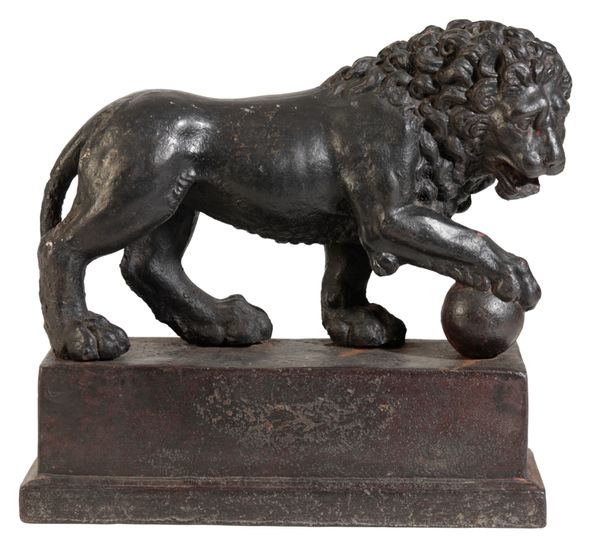 A CAST IRON AND PAINTED MODEL OF THE MEDICI LION