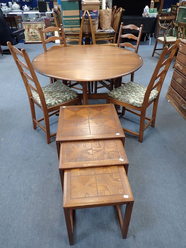 AN ERCOL NARROW DROP-LEAF DINING TABLE