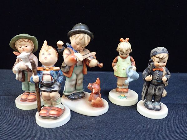 A COLLECTION OF HUMMEL FIGURES