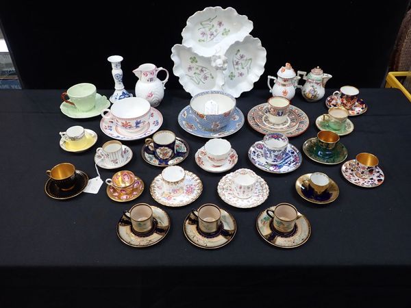 A COLLECTION OF COFFEE, TEA AND BREAKFAST CUPS AND SAUCERS