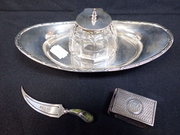 A SILVER MOUNTED INKWELL ON TRAY