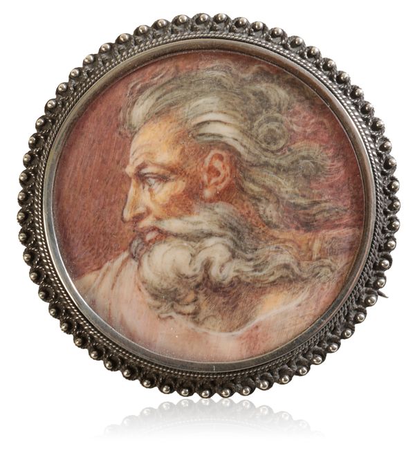 AN ITALIAN SILVER MOUNTED HANDPAINTED BROOCH