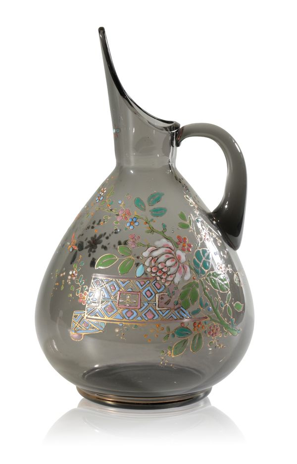 AN AESTHETIC MOVEMENT ENAMELLED GLASS EWER