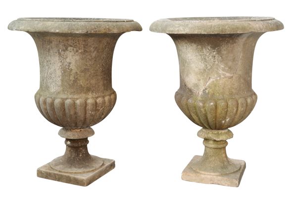 A LARGE PAIR OF WHITE MARBLE GARDEN URNS OF CAMPANA FORM