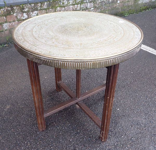 A NEAR EASTER BRASS TOP CIRCULAR OCCASIONAL TABLE