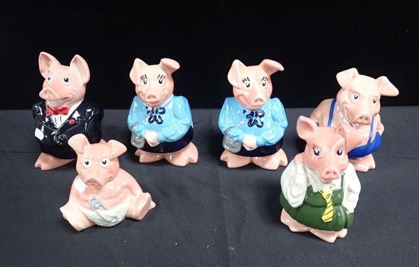 A SET OF NATIONAL WESTMINSTER BANK PIGGY BANKS