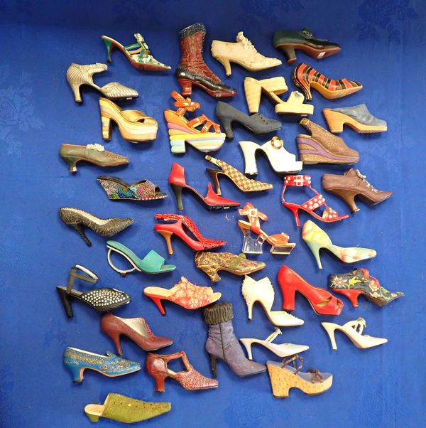 A COLLECTION OF MINIATURE SHOES