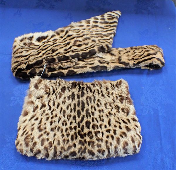 AN ANIMAL SKIN MUFF AND STOLE