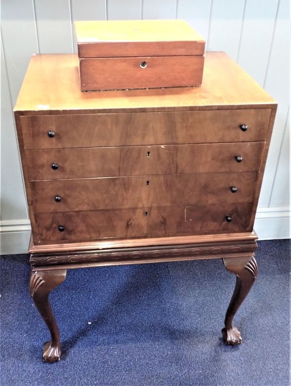 A 1930'S WALNUT CANTEEN CABINET