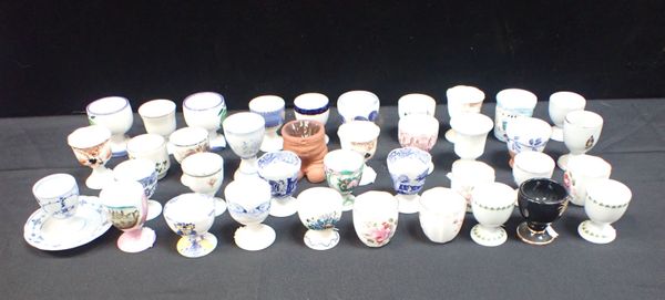 A COLLECTION OF EGG CUPS