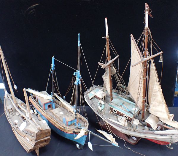 A COLLECTION OF FOLK ART FISHING BOATS