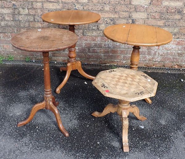 A GROUP OF FOUR TRIPOD TABLES