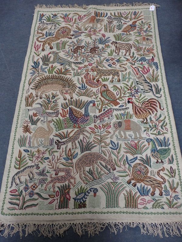 AN INDIAN WOOLWORK PANEL