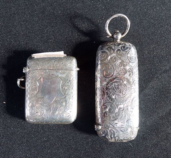 A SILVER VESTA CASE AND A COMBINED VESTA AND SOVEREIGN CASE