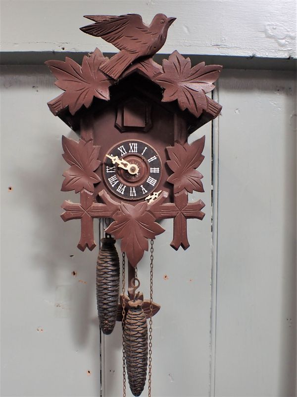 A BLACK FOREST CUCKOO CLOCK